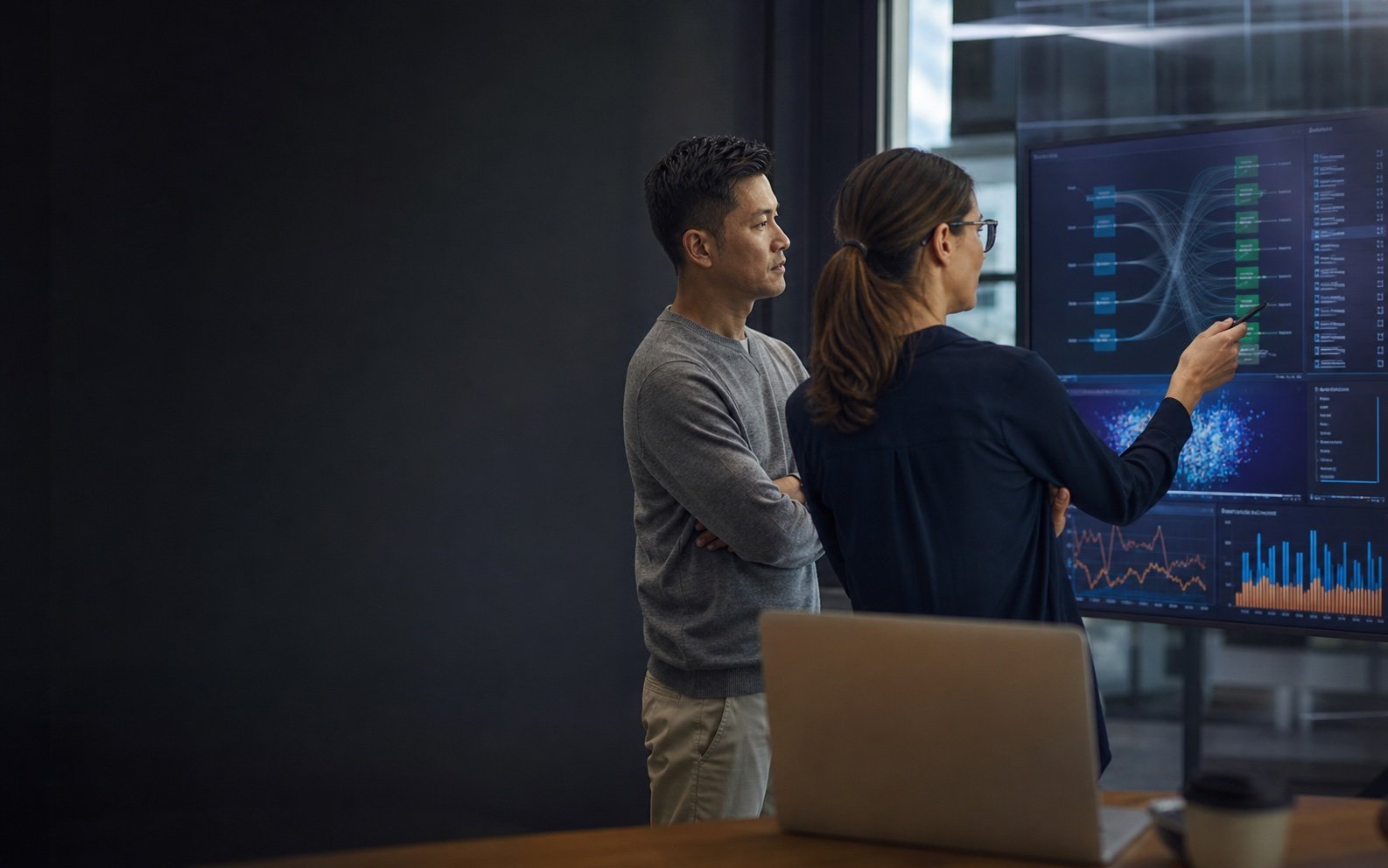 Engineering and business leads reviewing system performance